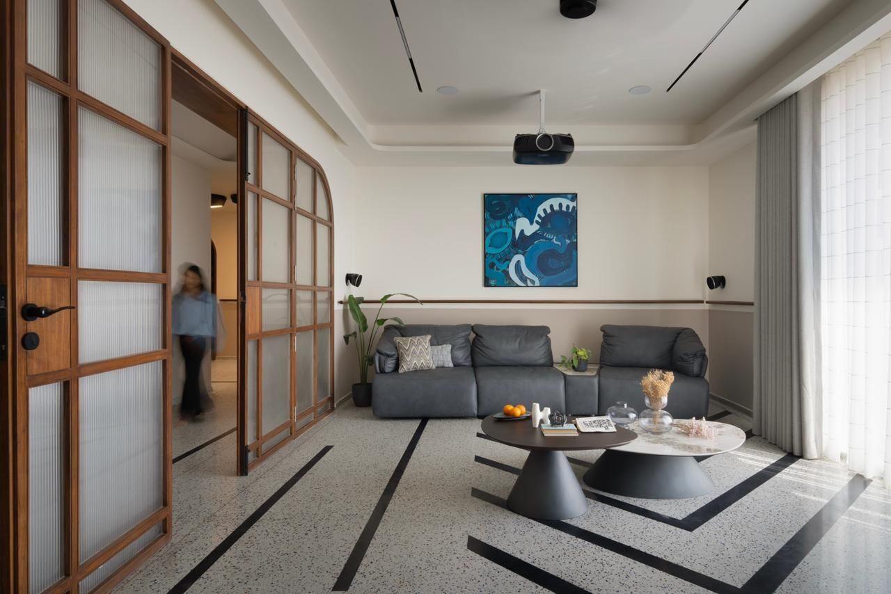 Gajera Residence living room with sliding wood-lattice doors