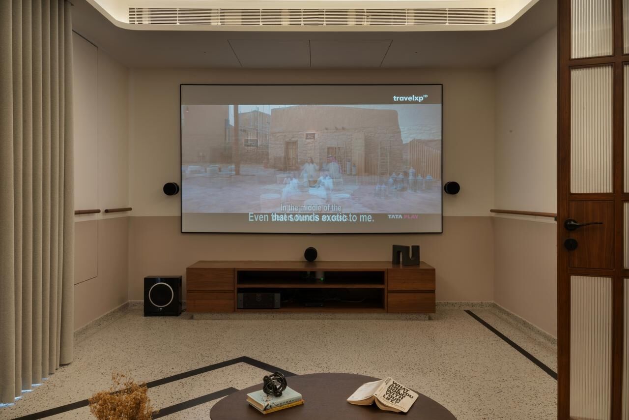 Gajera Residence home theater with projector screen and surround sound
